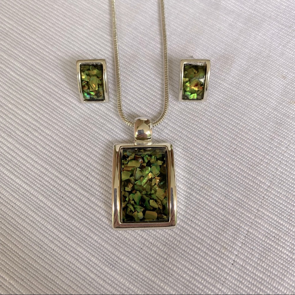 Beautiful silver pendant necklace with matching earrings